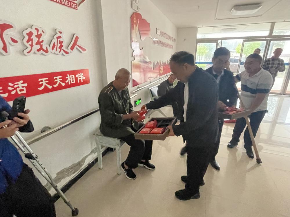 中国残联副主席张银良到河南驻马店高新区开展慰问活动